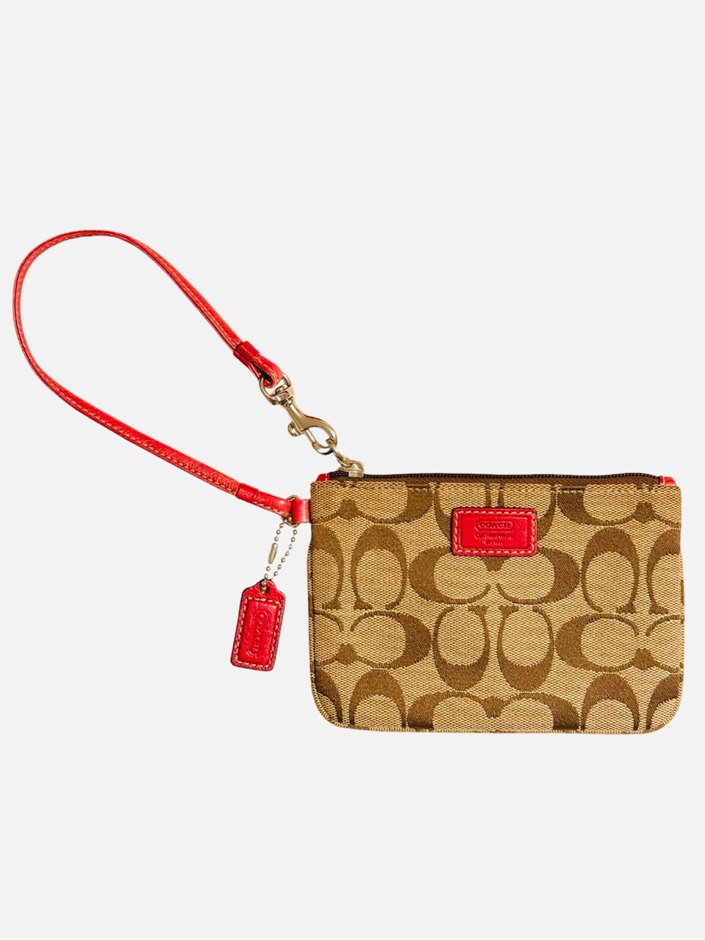 Coach Vintage Small Wristlet Pouch Features the Iconic Tan “C” Pink Bag Charm